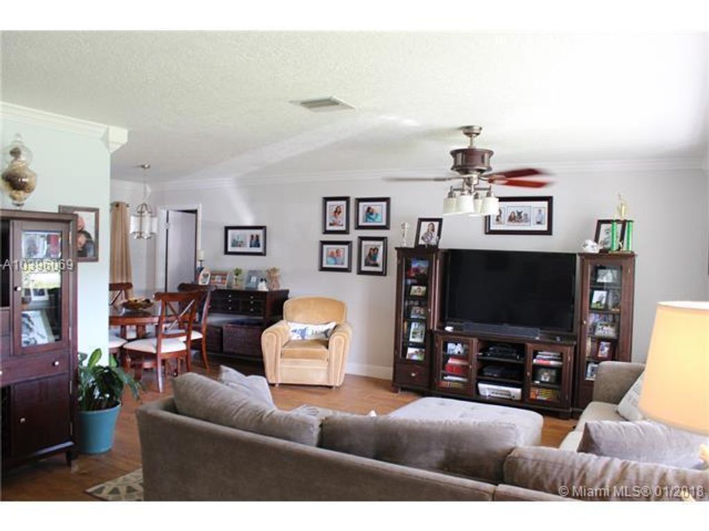 Photo of 461 NE 42nd Street, Boca Raton, FL 33431 (MLS # B26005452)