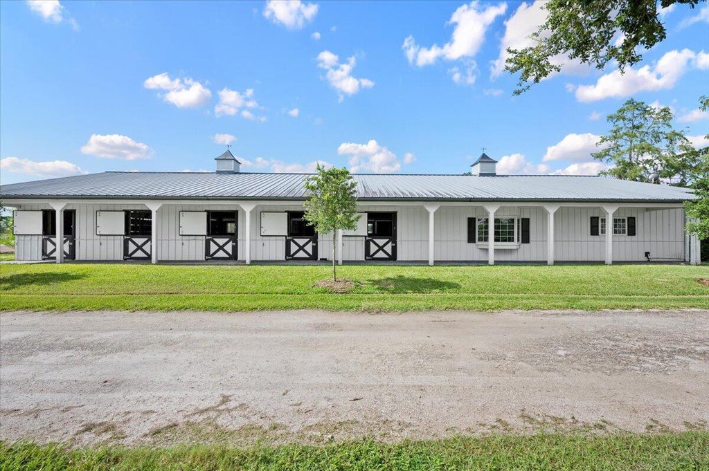 Photo of 10320 Randolph Siding Road, Jupiter, FL 33478 (MLS # B26071749)