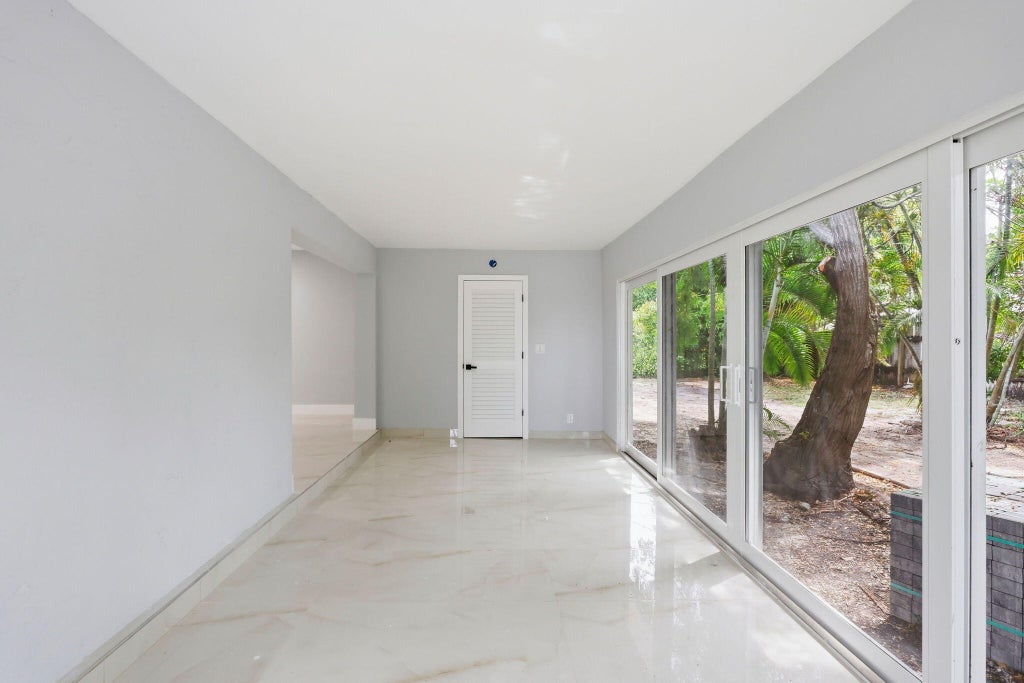 Photo of 2999 NE 2ND Avenue, Boca Raton, FL 33431 (MLS # B26077481)