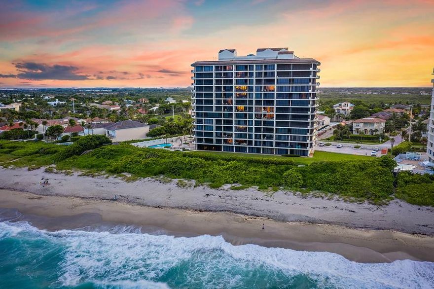 Stunningly remodeled and professionally designed and decorated 3 bedroom with 3 full baths and a powder room. This NE corner residence has spectacular direct ocean, city and northern views up the coast to the Juno Pier. Private Elevator. Kitchen opened up and appointed with new cabinetry, Induction range and stainless appliances. Master Bedroom has been reconfigured with larger His & Her Walk in closets. Beautifully remodeled wet bar with glass tile, sink and commercial wine fridge. Porcelain tile flooring in the bedrooms and all new baseboards. Motorized window treatments throughout and a Lutron lighting system with Sonos. The laundry room was tastefully redone with upgraded tile floors and plenty of storage. Reverse osmosis system and much more. Direct oceanfront building w/pool & fitnes