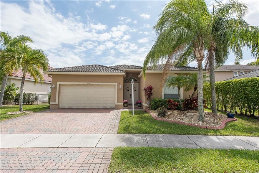 Immaculate 3/2, pool home in desirable Pelican Trails of Wyndham Lakes! Outstanding features include open floor plan w/ split bedrooms; open kitchen w/ full pantry - and overlooking large family room; formal dining area; laundry room; brick-pavered driveway; private backyard w/ beautiful free-form pool & much more! Upgrades include tile flooring throughout common areas & wood/wood laminate flooring in all bedrooms; upgraded kitchen w/ granite counters & stainless appliances; newer a/c & more. Hurry!