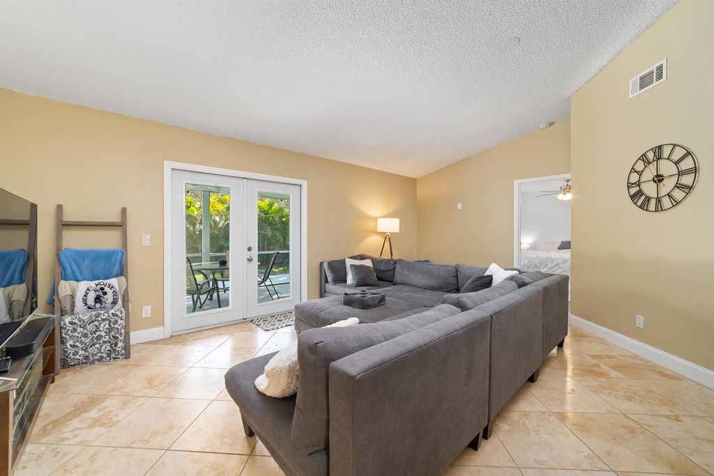 Photo of 103 Arrowhead Circle, Jupiter, FL 33458 (MLS # R10962743)