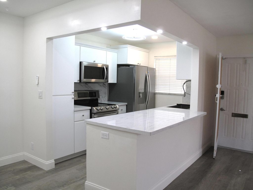 Photo of 1217 S Drive Way #A, Delray Beach, FL 33445 (MLS # B26005240)