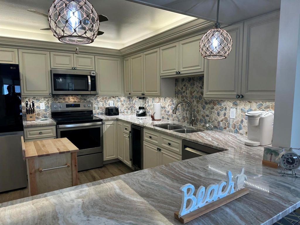 Photo of 3100 N Highway A1a #502, Hutchinson Island, FL 34949 (MLS # R11002349)