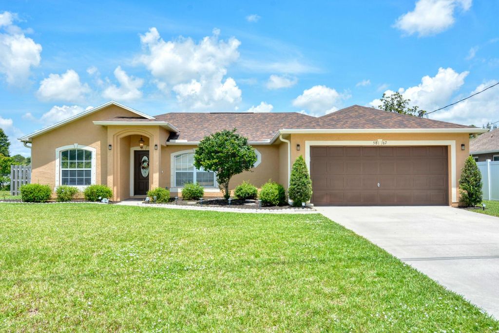 Photo of 5867 NW Zenith Drive, Port St Lucie, FL 34986 (MLS # R10896708)