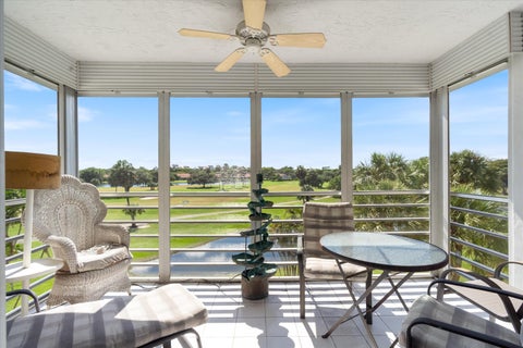 Photo of 3980 Oaks Clubhouse Drive #411, Pompano Beach, FL 33069 (MLS # B26085062)