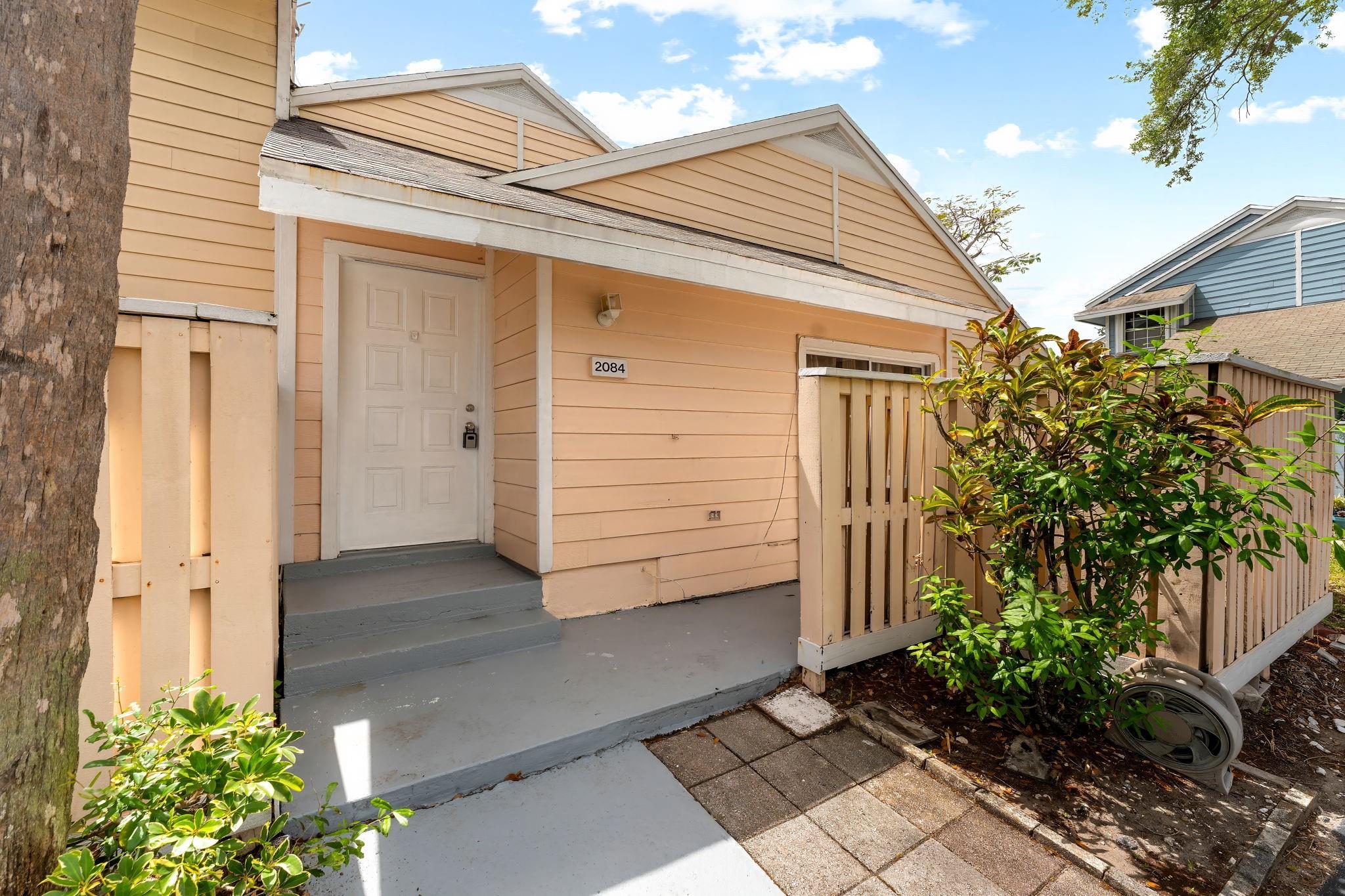 Beautiful remodel 2 BR, 1 bath in North Lauderdale. Step inside to find an inviting open floor plan that seamlessly connects the living, dining, and kitchen areas, all under vaulted ceilings that enhance the sense of space. The kitchen features a tasteful tiled backsplash, a breakfast bar for casual dining, ample cabinetry, making it a perfect spot for both cooking and entertaining. Newer kitchen appliances, spacious large rooms come with washer and dryer. This home is a corner unit nestled in a friendly community; you'll enjoy easy access to shopping, dining, entertainment, and top-rated schools. Low HOA fee, HOA covers roof and exterior building insurance. AC and water heater replaced 2020. FHA APPROVED! HOA HAS RESERVE FUNDS.