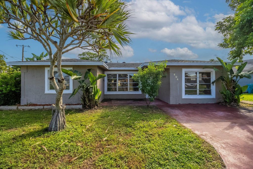 Photo of 404 NW 5th Avenue, Boynton Beach, FL 33435 (MLS # F10528625)