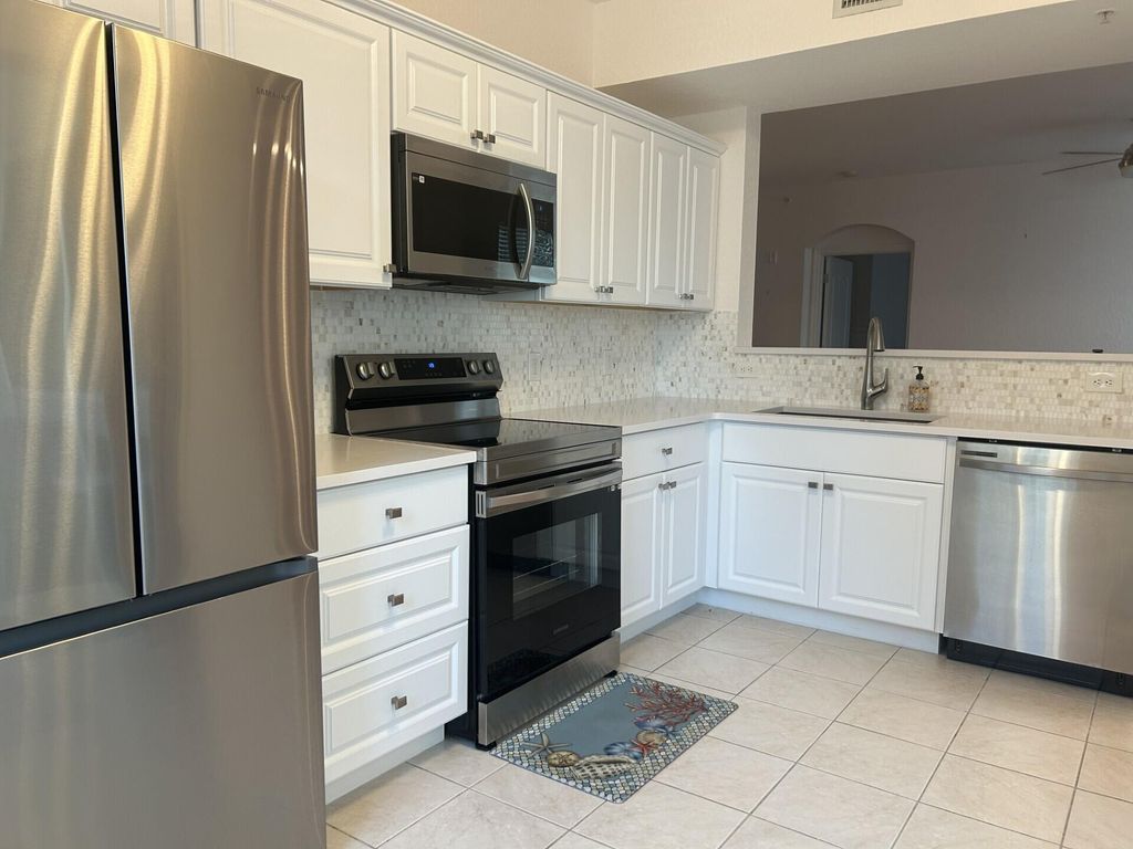 Photo of 11027 Legacy Boulevard #102, Palm Beach Gardens, FL 33410 (MLS # R11099495)