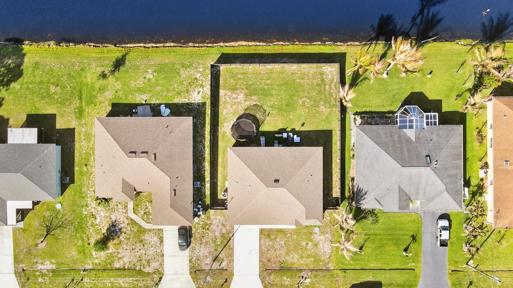 Photo of 1892 SW Monterrey Lane, Port Saint Lucie, FL 34953 (MLS # B26015328)