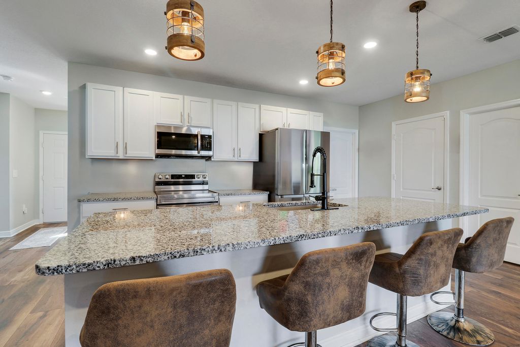 Photo of 1892 SW Monterrey Lane, Port Saint Lucie, FL 34953 (MLS # B26015328)