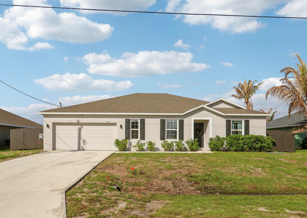 Photo of 1892 SW Monterrey Lane, Port Saint Lucie, FL 34953 (MLS # B26015328)