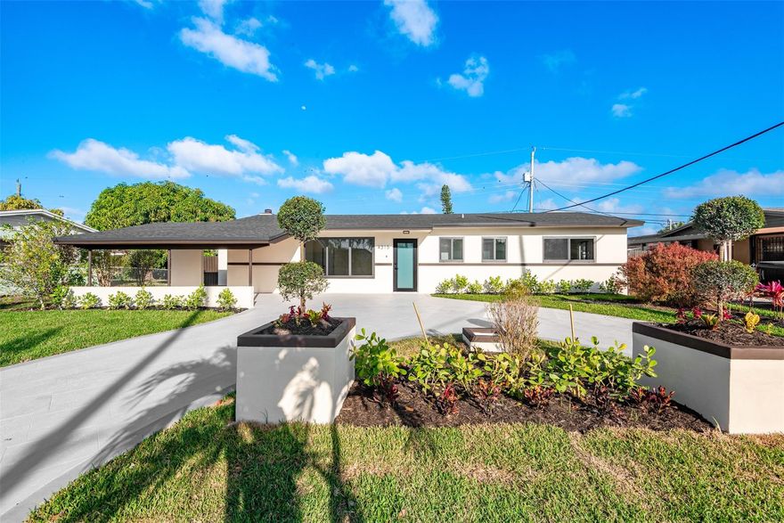 This beautifully redone 3/2 home in an amazing Westchester neighborhood greets you with amazing curb appeal, and features a completely separate GUEST/ IN LAW SUITE. The home features three bedrooms, two bathrooms, a carport, fully fenced yard, and ultra-modern finishes throughout. The guest/ in law suite features a full kitchen, bathroom, and a versatile, open space. This one is truly a masterpiece, with no detail left spared. All impact windows/ doors throughout, plus a brand new roof. Must see to believe!