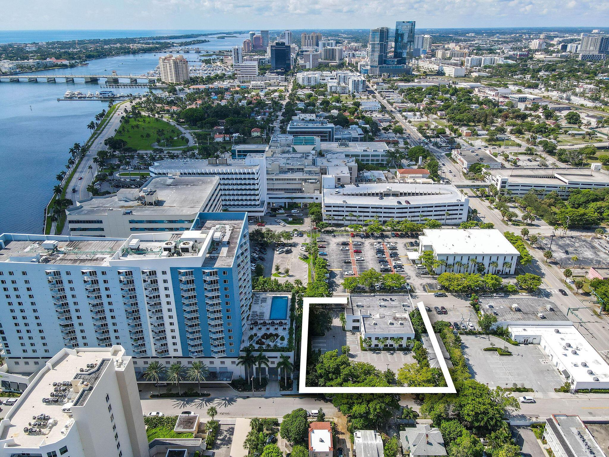 This impressive stand alone office building (+/ 13,488 sqft on a 25,495 sqft lot ) is conveniently located just off Flagler Drive, strategically positioned in the heart of West Palm Beach, amidst the numerous new waterfront development projects such as the Ritz Carlton, O Lara, and Nora. The building currently features approx 5,000 sqft of adaptable, fully built-out medical office space however is suitable for a wide variety of uses given the flexible zoning.Completely renovated in 2019, this property is perfectly suited for an owner-user ready to move in and customize the remaining space to their specifications. This property also offers significant potential as a prime development site or income producing opportunity.