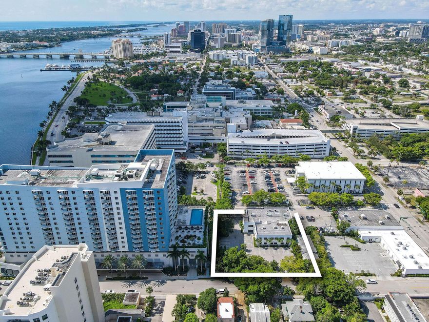 This impressive stand alone office building (+/ 13,488 sqft on a 25,495 sqft lot ) is conveniently located just off  Flagler Drive, strategically positioned in the heart of West Palm Beach, amidst the numerous new waterfront development projects such as  the Ritz Carlton, O Lara, and Nora. The building currently features approx 5,000 sqft of adaptable, fully built-out medical office space however is suitable for a wide variety of uses given the flexible zoning.Completely renovated in 2019, this property is perfectly suited for an owner-user ready to move in and customize the remaining space to their specifications. This property also offers significant potential as a prime development site or income producing opportunity.
