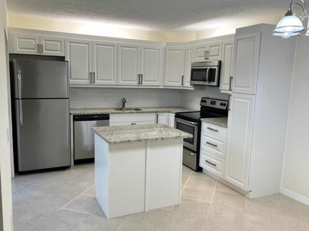 Photo of 1116 11th Lane, Palm Beach Gardens, FL 33418 (MLS # R10775487)