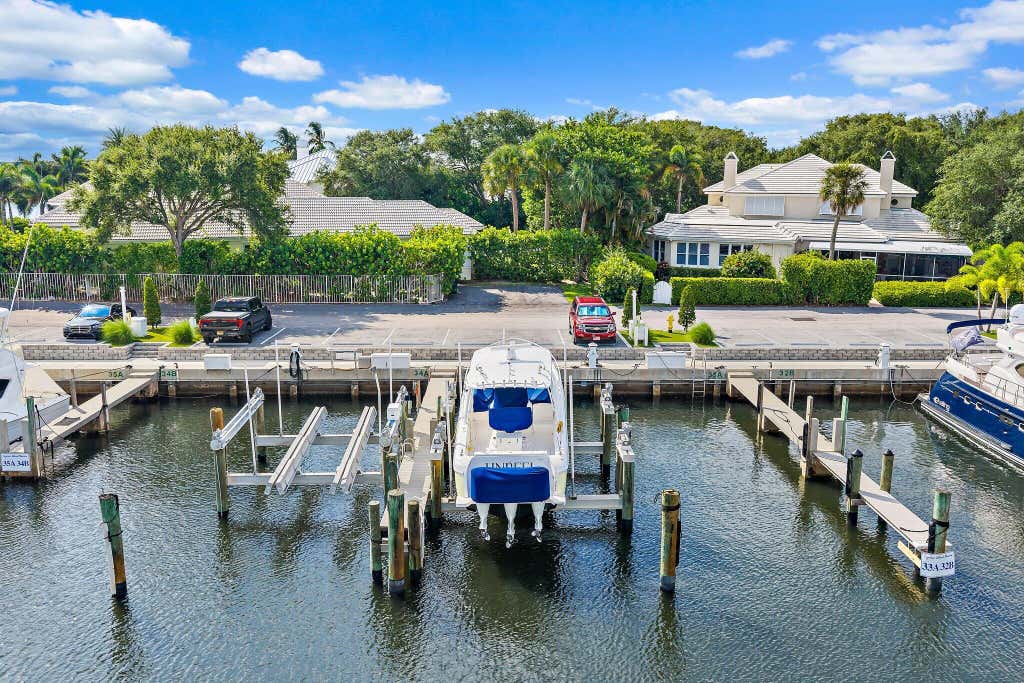 Photo of 14410 PALMWOOD Road, Palm Beach Gardens, FL 33410 (MLS # B26062094)
