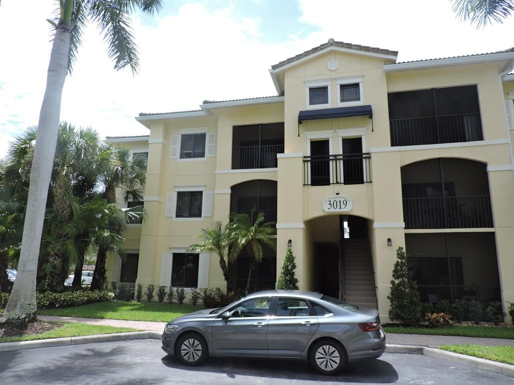 Photo of 3019 Alcazar Place Pl #301, Palm Beach Gardens, FL 33410 (MLS # R10828242)
