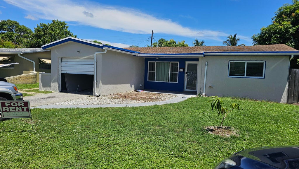 Photo of 3523 NW 33rd Court, Lauderdale Lakes, FL 33309 (MLS # B26081690)