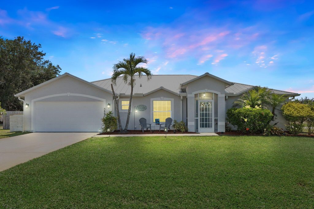 Photo of 3802 SW Hainlin Street, Port Saint Lucie, FL 34953 (MLS # R10992934)