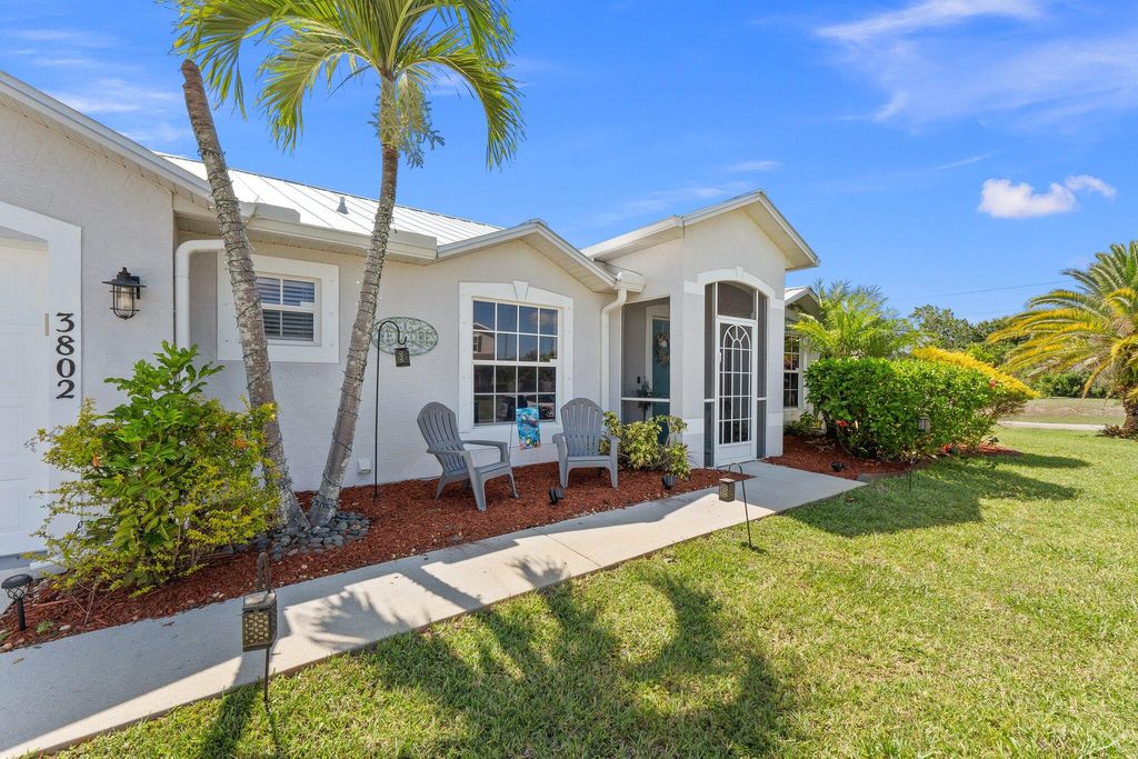 Photo of 3802 SW Hainlin Street, Port Saint Lucie, FL 34953 (MLS # R10992934)