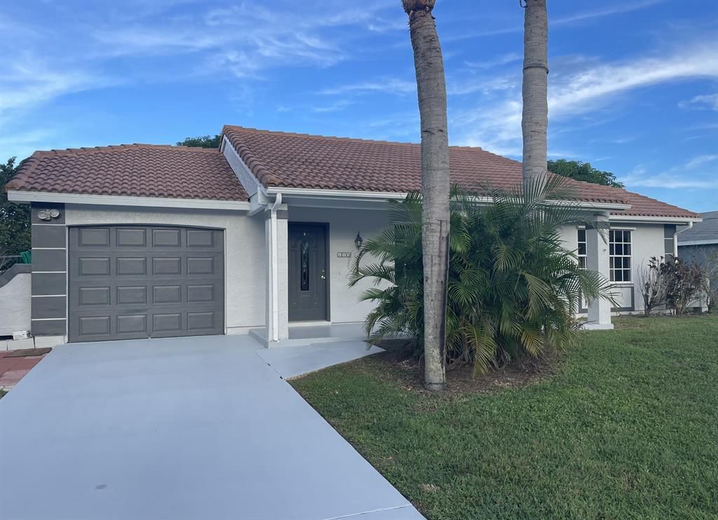 Photo of 109 SW Covington Road Rd, Port St Lucie, FL 34953 (MLS # R10833459)