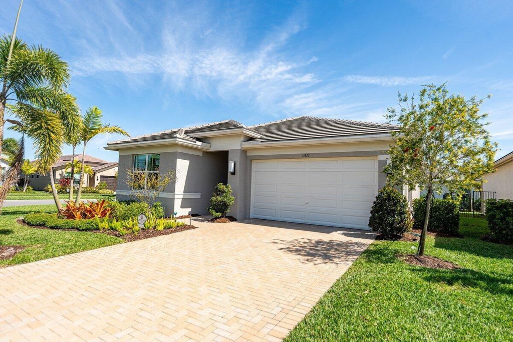 Photo of 11673 SW Oceanus Boulevard, Port Saint Lucie, FL 34987 (MLS # R11065222)
