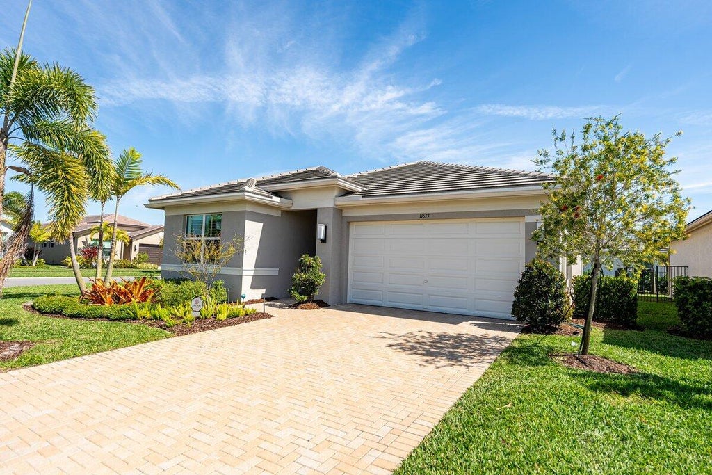 Photo of 11673 SW Oceanus Boulevard, Port Saint Lucie, FL 34987 (MLS # R11065222)