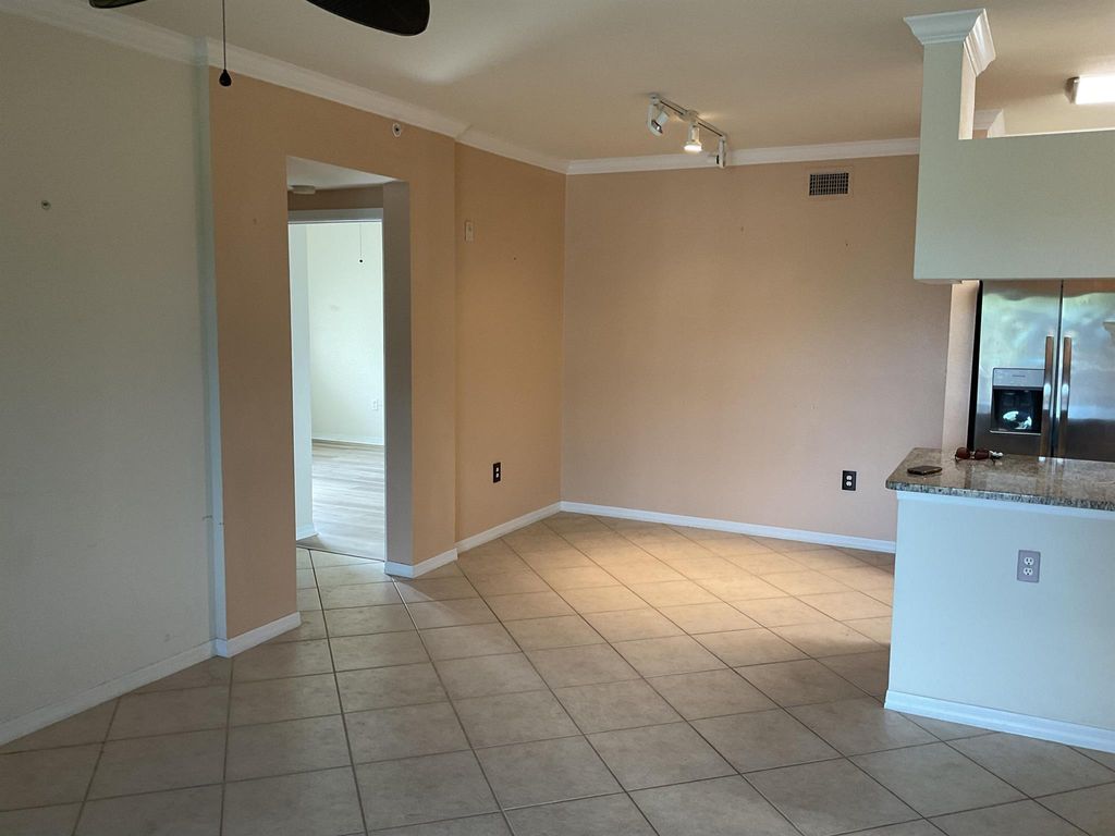 Photo of 6529 Emerald Dunes Drive #305, West Palm Beach, FL 33411 (MLS # R11140211)