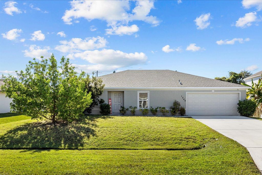 Photo of 1246 SW Asturia Avenue, Port Saint Lucie, FL 34953 (MLS # R11131984)