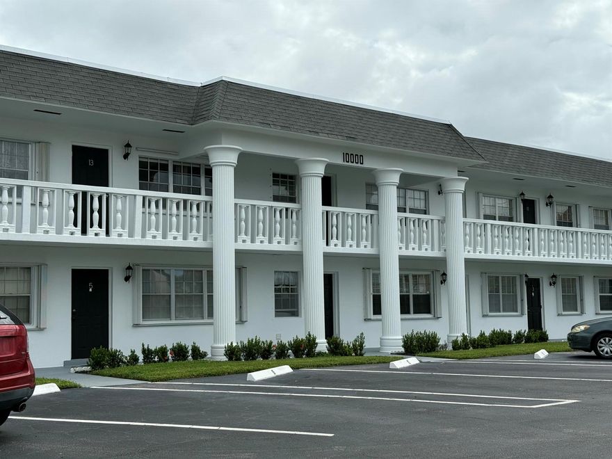 Move right into this beautifully updated 2-bedroom, 1.5-bath second-floor unit in a friendly 55+ community. The home features fresh paint throughout, hurricane panels for peace of mind, and a convenient exterior storage room.Enjoy resort-style amenities including a community pool, shuffleboard courts, and a clubhouse with a library and internet access. Located just steps from Publix and the surrounding shopping plaza, everything you need is within walking distance.Monthly assessments cover water, sewer, cable, and internet. Rental restrictions apply.