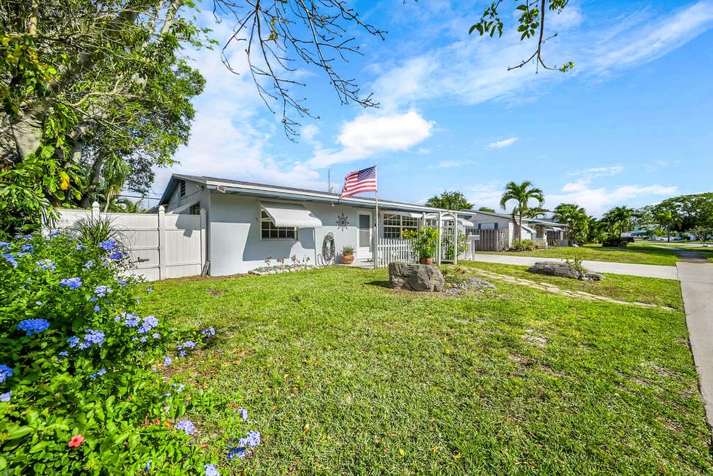 Photo of 708 Cinnamon Road, North Palm Beach, FL 33408 (MLS # R11084822)