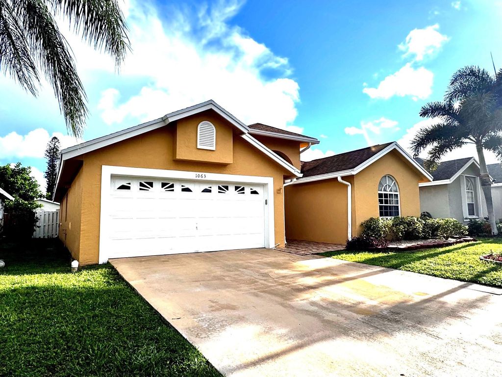 Photo of 1063 Fairfax Circle, Boynton Beach, FL 33436 (MLS # F10526579)