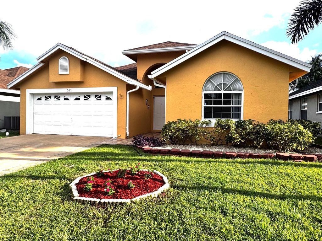 Photo of 1063 Fairfax Circle, Boynton Beach, FL 33436 (MLS # F10526579)