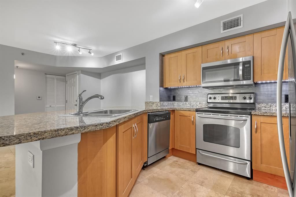 Photo of 3133 Clint Moore Road #104, Boca Raton, FL 33496 (MLS # R10899324)