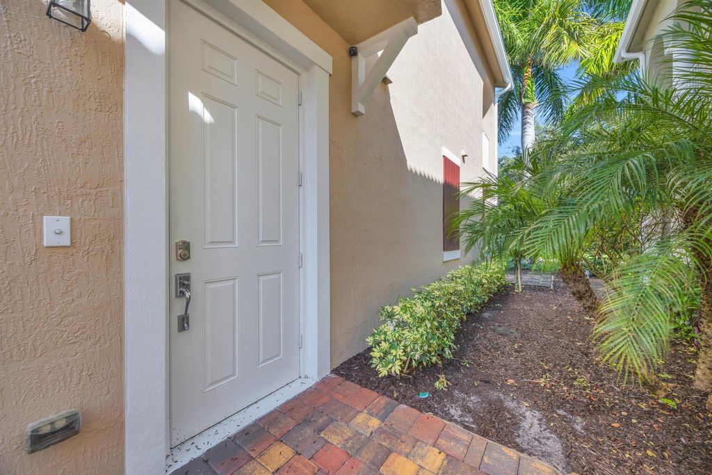 Photo of 1080 Community Drive, Jupiter, FL 33458 (MLS # R11136835)