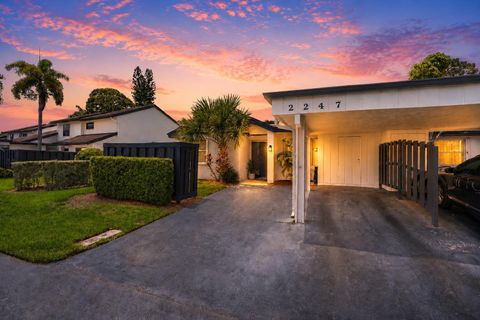 Photo of 2247 Deer Creek Woodlands Way, Deerfield Beach, FL 33442 (MLS # B26041043)