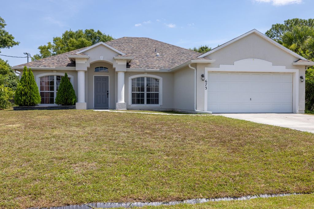 Photo of 673 SW Lucero Drive Dr, Port Saint Lucie, FL 34983 (MLS # R10811470)