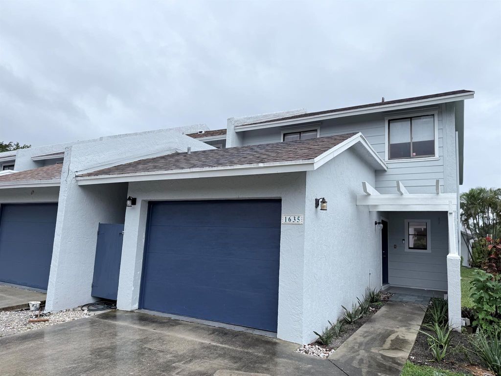 Photo of 1635 Woodbridge Lakes Circle, West Palm Beach, FL 33406 (MLS # R11147446)