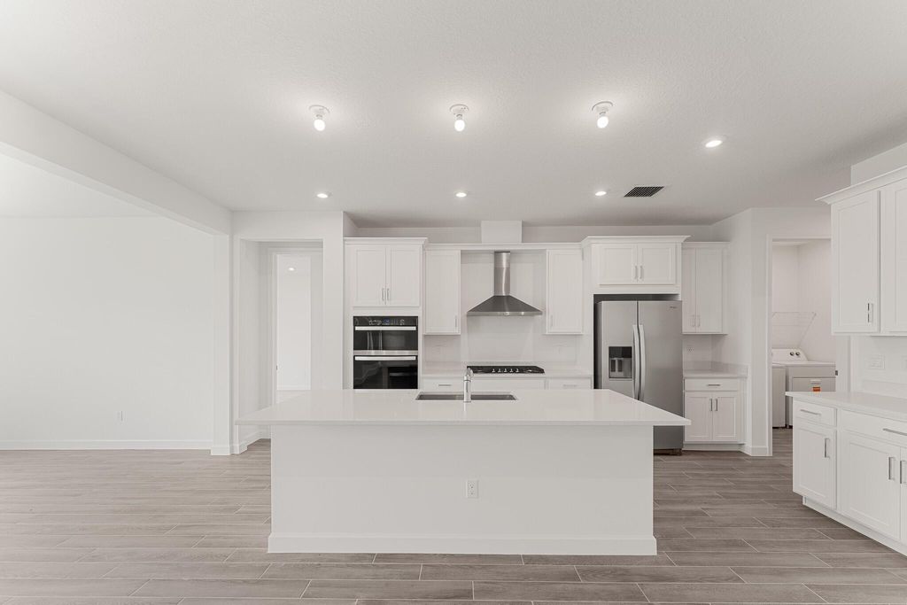 Photo of 9570 SW Indra Way, Port Saint Lucie, FL 34987 (MLS # R11128901)