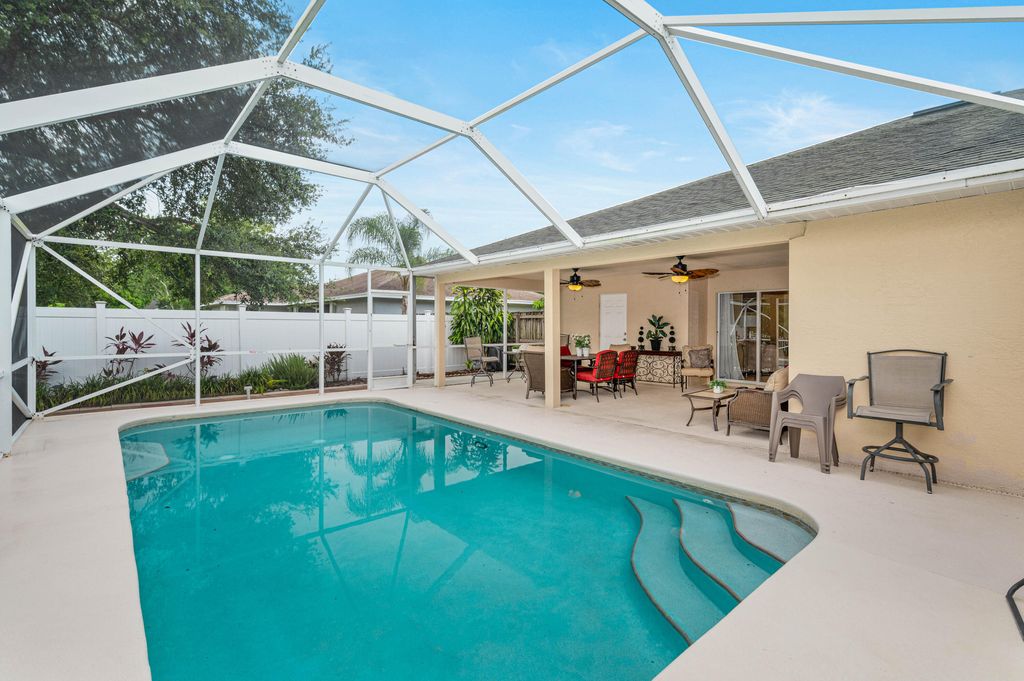 Photo of 2450 SW Dalpina Road, Port Saint Lucie, FL 34953 (MLS # R10805639)