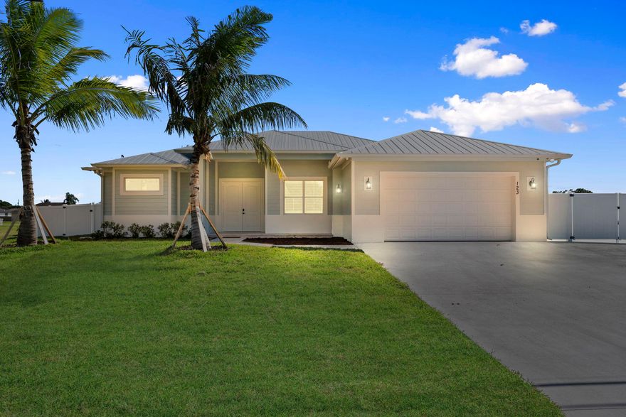 Custom Build! You can still select your colors & finishes. If you are looking for a home that will be built with extreme consideration for value, quality, efficiency & detail, this is the perfect option. Southern Coastal Construction has brought a spacious & thoughtful floorplan to the market with 2300 sq ft of living space, 10 ft flat ceilings, 8 ft doors. Gorgeous custom wood trim throughout, crown molding and wood window sills. Some of the quality construction features are PGT Brand Impact windows, stucco soffits, spray foam insulation in attic & water proof subflooring. The custom kitchen offers a 10 ft island with quartz countertops, pendant lighting & Shaker Style cabinetry. State of the art LG appliance package comes with the home. Plenty of room for a pool. This is the Islander floor plan, pictures are of a completed customer home and are for reference purposes only. Expected to be completed SUMMER 2026.