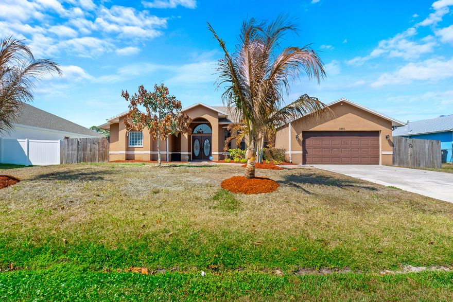 Gatlin neighborhood, you'll enjoy easy access to Tradition shopping, schools, and entertainment, as well as convenient I-95 access. Inside you'll be greeted by a spacious living and dining area featuring French doors that open onto a covered patio and sparkling pool. The eat-in kitchen is a chef's dream, boasting stainless steel refrigerator and dishwasher, soft-close cabinets, a prep island, and granite countertops. The primary suite is a true retreat, featuring wood-look tile flooring, a spa-like bathroom with a rain shower and dual vanities, and French doors leading to the patio. Relax and unwind in the heated pool and spa, easily controlled by the iAqualink system. Enjoy outdoor entertaining on the expansive covered patio, complete with accordion shutters for added security. This meticulously maintained home offers a fully fenced yard, a new roof installed in 2020, new water heater, a new AC unit from April 2020. Don't miss this opportunity to make this beautiful property your own!