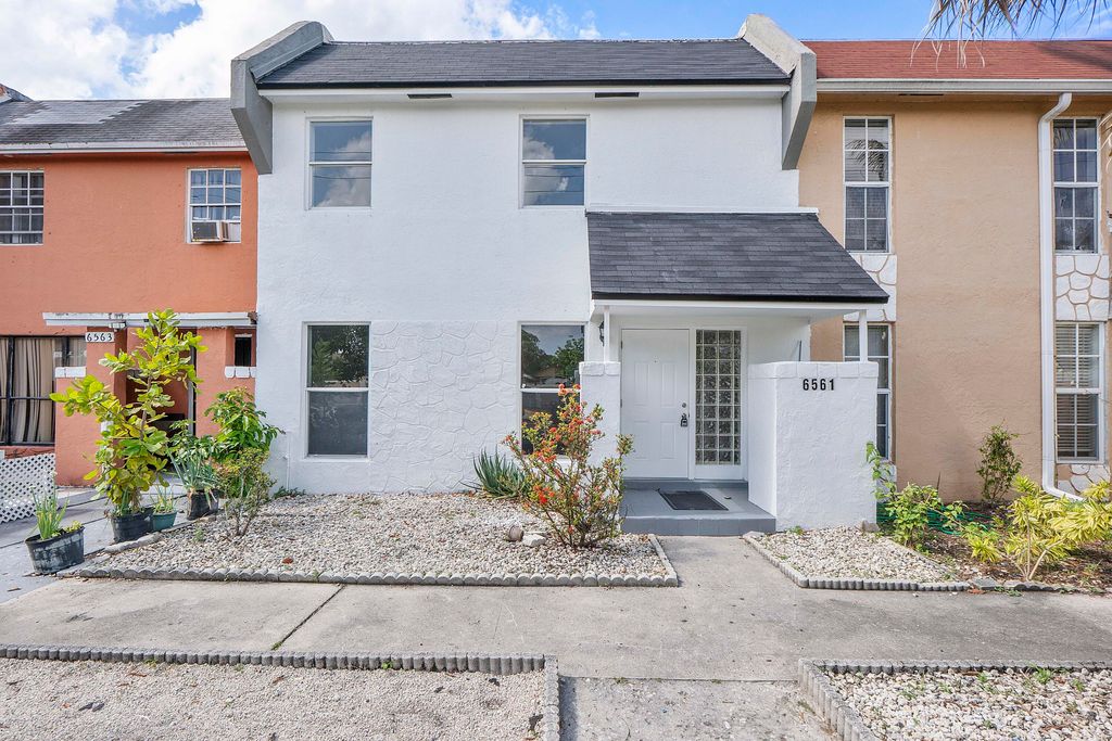 Photo of 6561 Boulevard Of Champions, North Lauderdale, FL 33068 (MLS # B26025008)