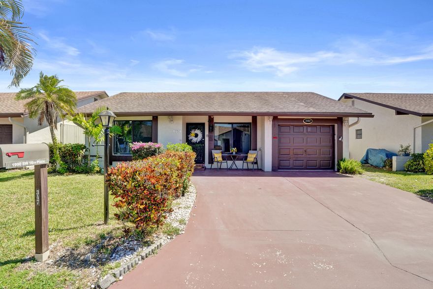 Welcome to this spacious two-bedroom, two-bath home in the desirable Meadows of Crystal Lake, a 55+ active adult community. This home features an open-concept layout with tile flooring throughout, a large living and dining area, and a separate family room for added living space. The kitchen offers light wood cabinetry, granite countertops, and granite backsplash. The primary suite includes a walk-in closet, and the secondary bedroom is generously sized with an updated bathroom. Additional highlights include impact windows and doors, enclosed Florida room, fresh interior paint, and a one-car garage. Flat roof 2025, main roof 2006, water heater 2009. Enjoy a welcoming front porch and an amenity-rich community with an active lifestyle.