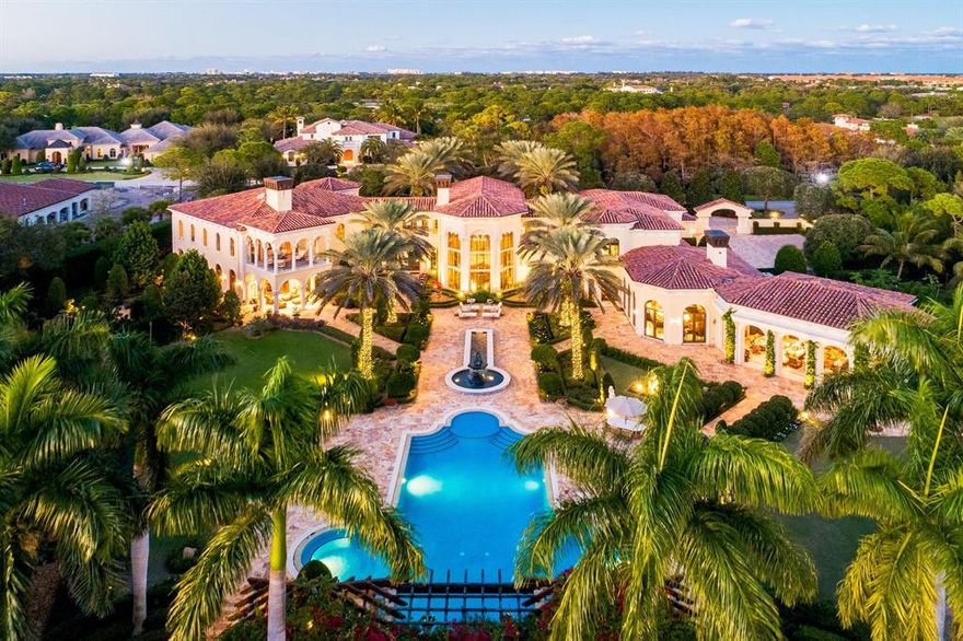 Introducing private legacy estate ''The Venetian Palazzo'' located in the Prestigious Bears Club. A truly extraordinary ''tech savvy estate'' situated on a private 2-acre lot surrounded by preserve land offering nearly 17,000 in luxurious living space. The unique designs, finishes, & fixtures throughout the estate were the result of extensive research of actual Italian Palazzos & Villas in Florence. From intricate millwork, European hand-painted ceilings, museum designed sculpture gardens, 60,000 gallon edgeless free-form swimming pool, 20 different types of hand-cut marble from 12 different countries in this inception. This timeless & unequaled estate is meant for a truly discerning buyer looking for something that cannot be duplicated. This is without a doubt one for the ages.