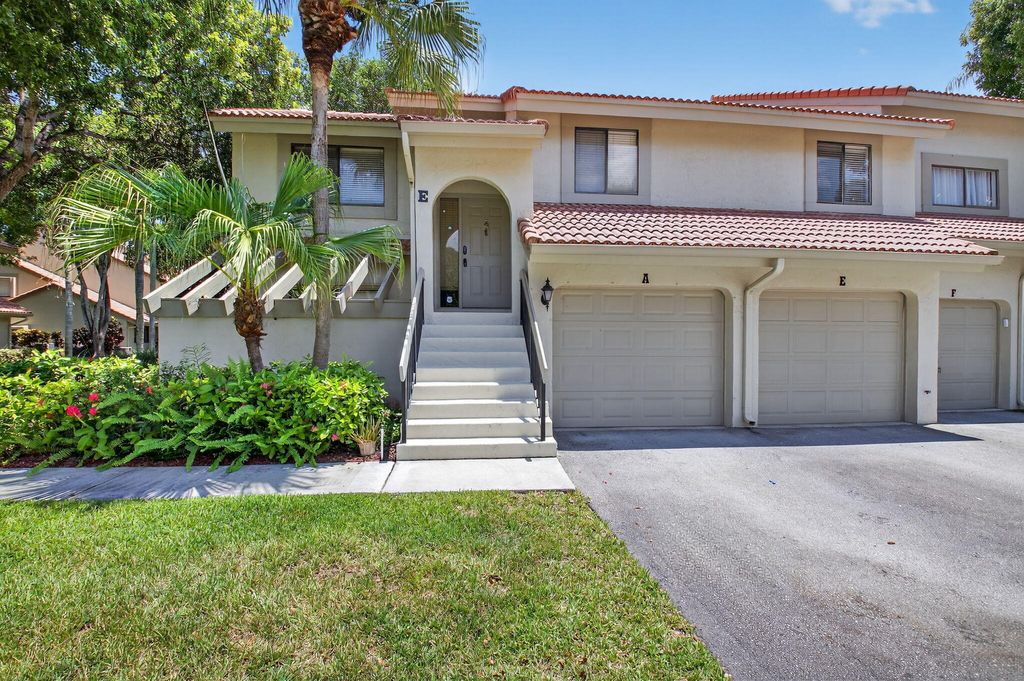 Photo of 5530 Coach House Circle #E, Boca Raton, FL 33486 (MLS # B26023824)