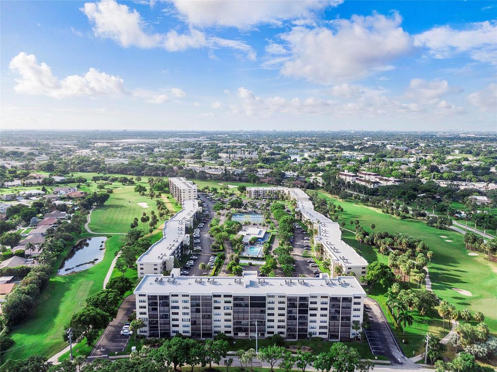 Photo of 2400 Deer Creek Country Club Boulevard #606, Deerfield Beach, FL 33442 (MLS # F10556597)