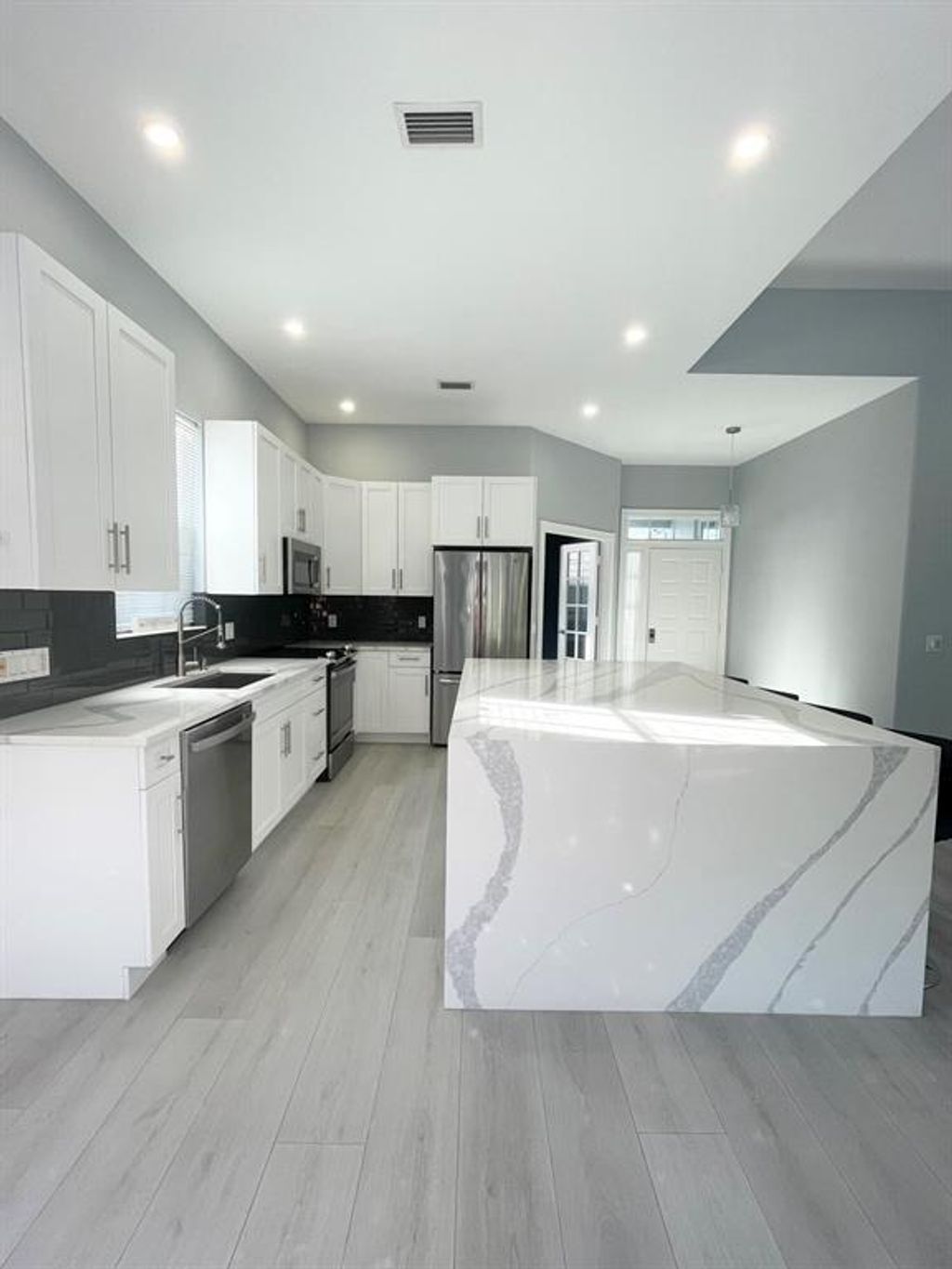 Photo of 304 NW Bentley Circle, Port Saint Lucie, FL 34986 (MLS # R11057923)