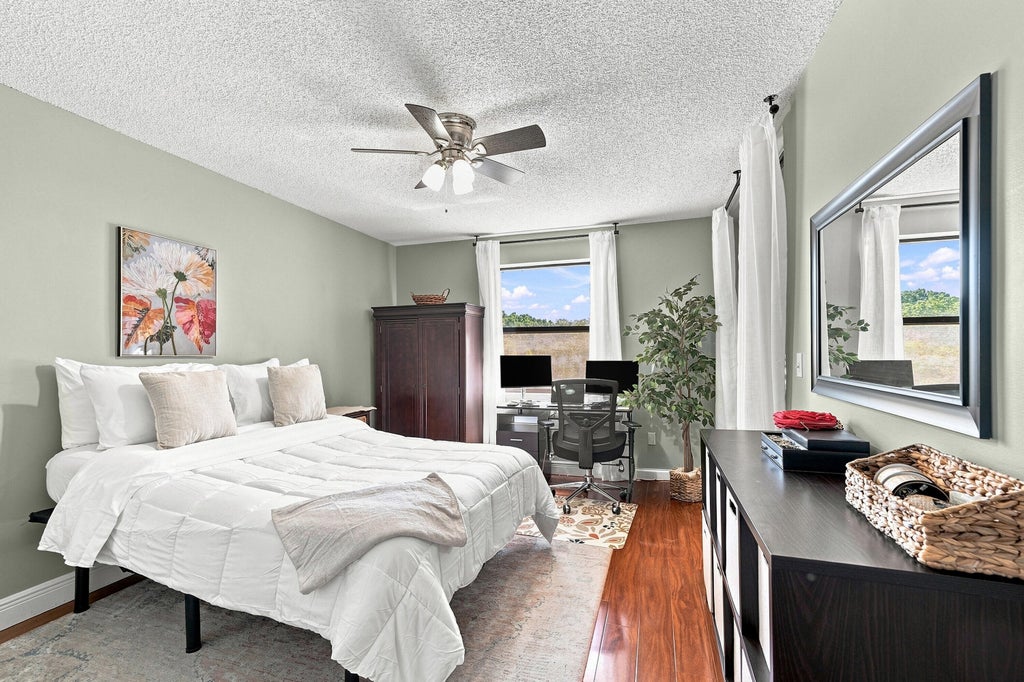 Photo of 4111 CORAL TREE Circle #321, Coconut Creek, FL 33073 (MLS # B26065640)